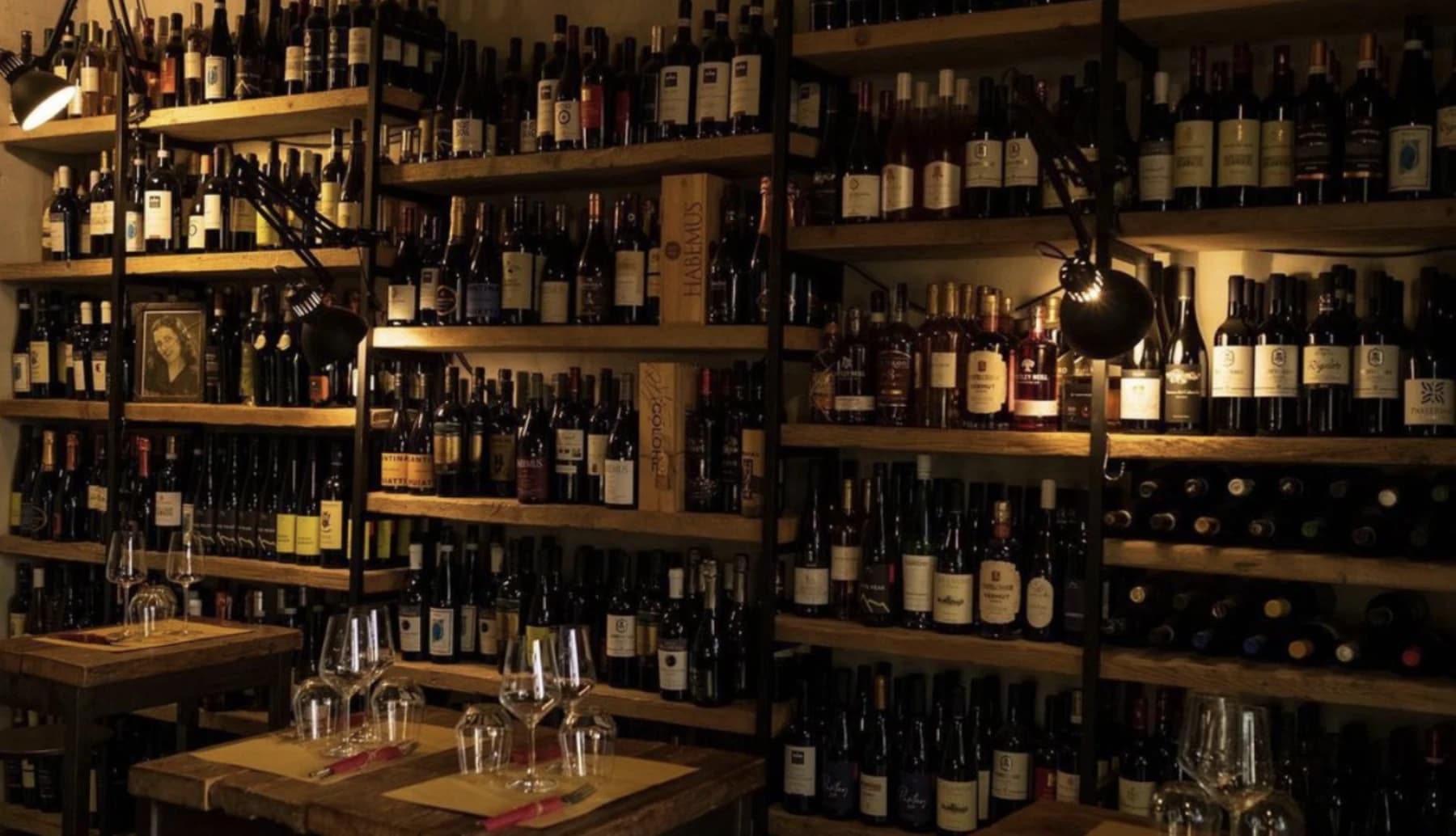 Wine bottles inside neighborhood trattoria