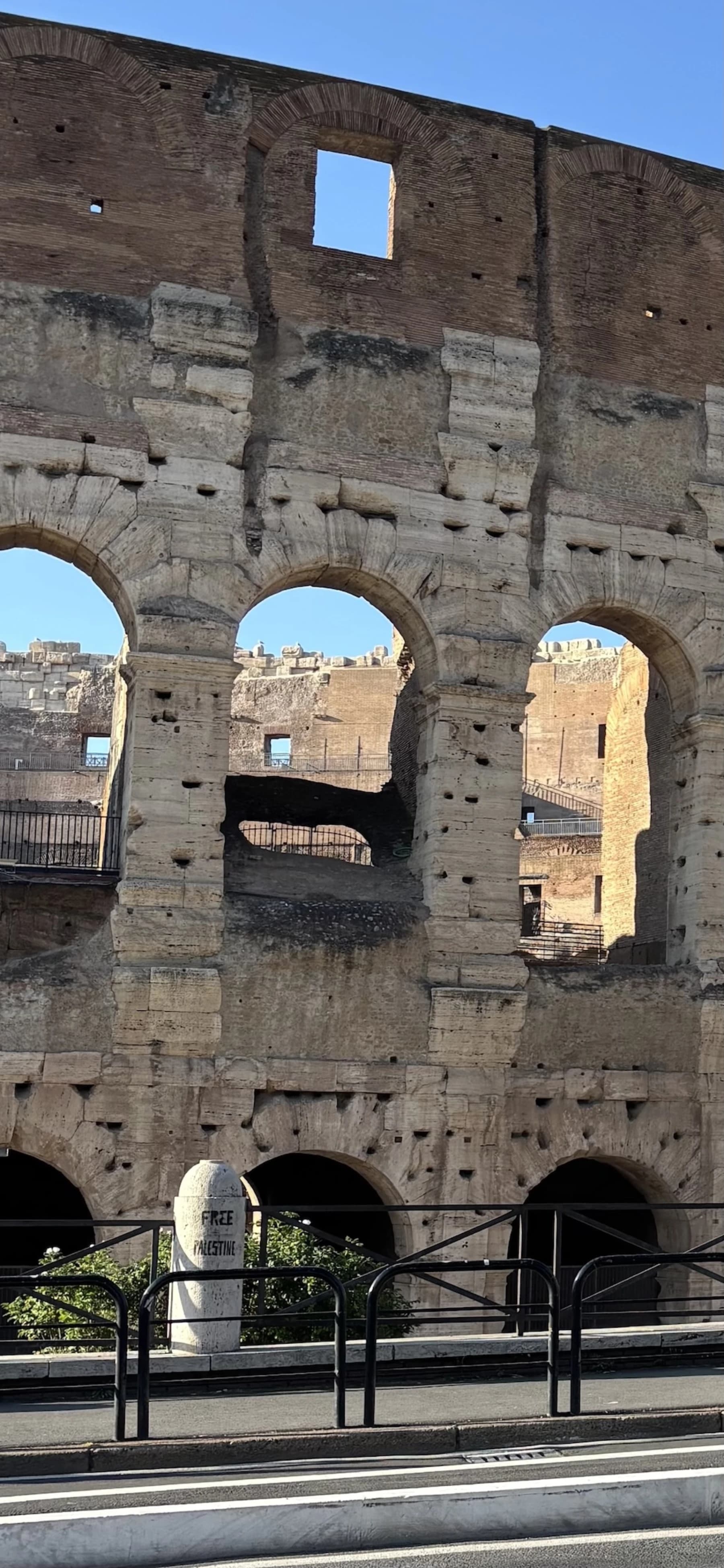 Colosseum arches in midday light