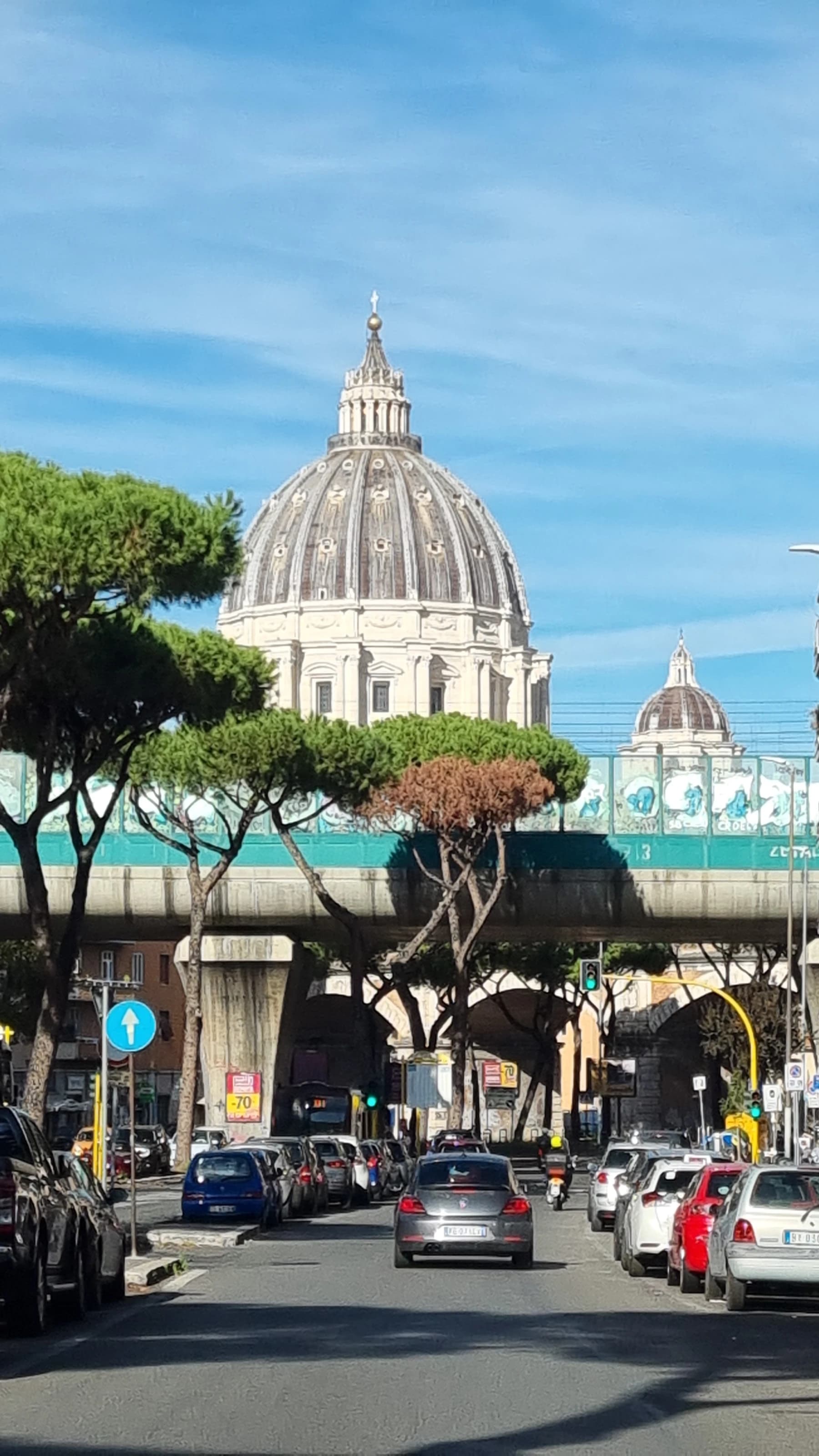 St. Peter's dome above a Roman street