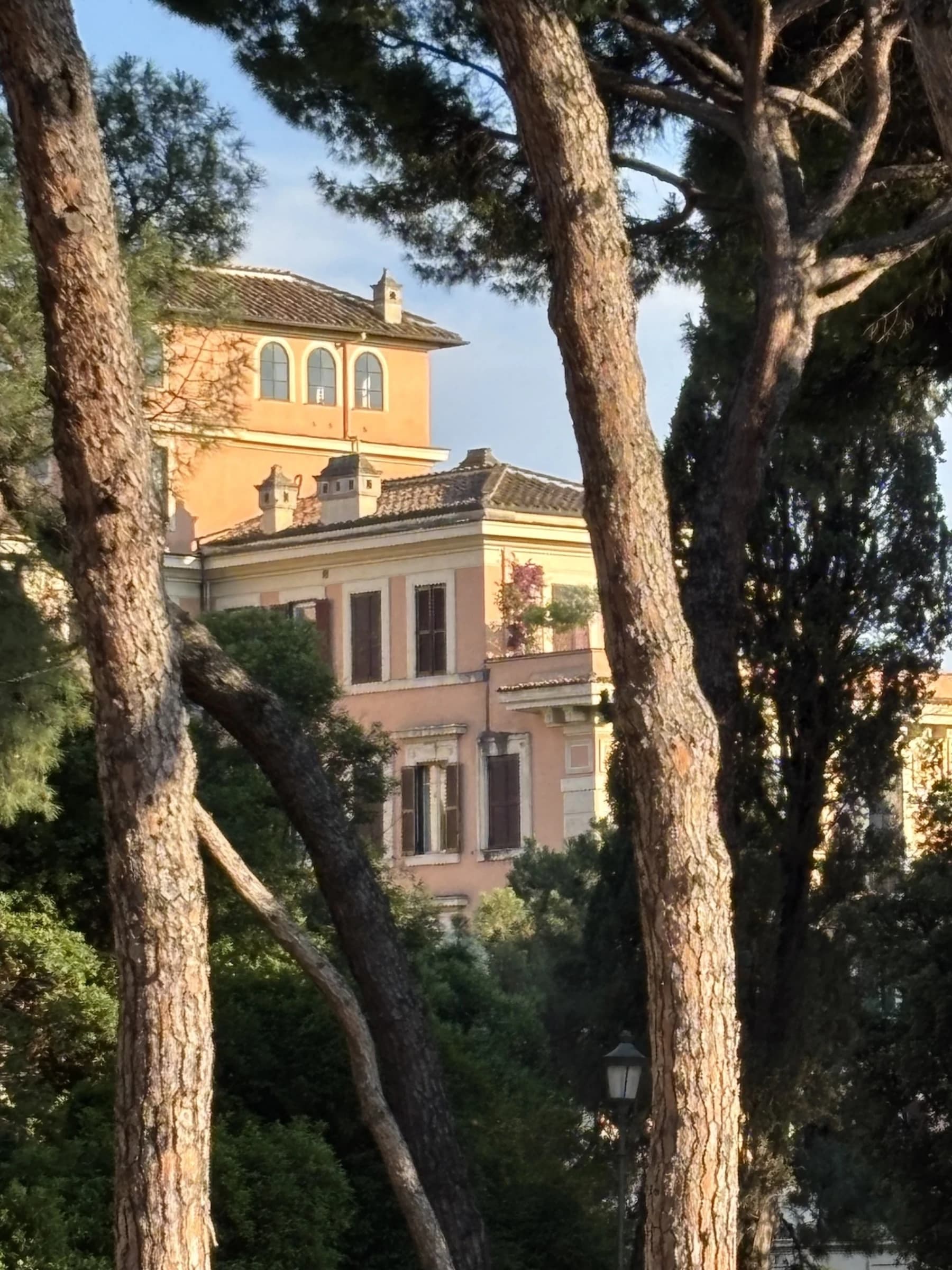 Villa framed by pines at Villa Torlonia