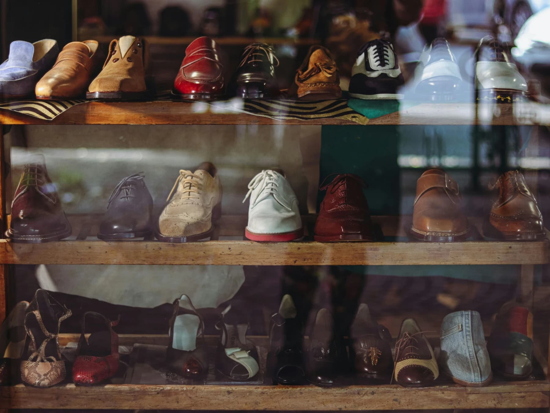 Shelves of vintage shoes in a Roman shop window