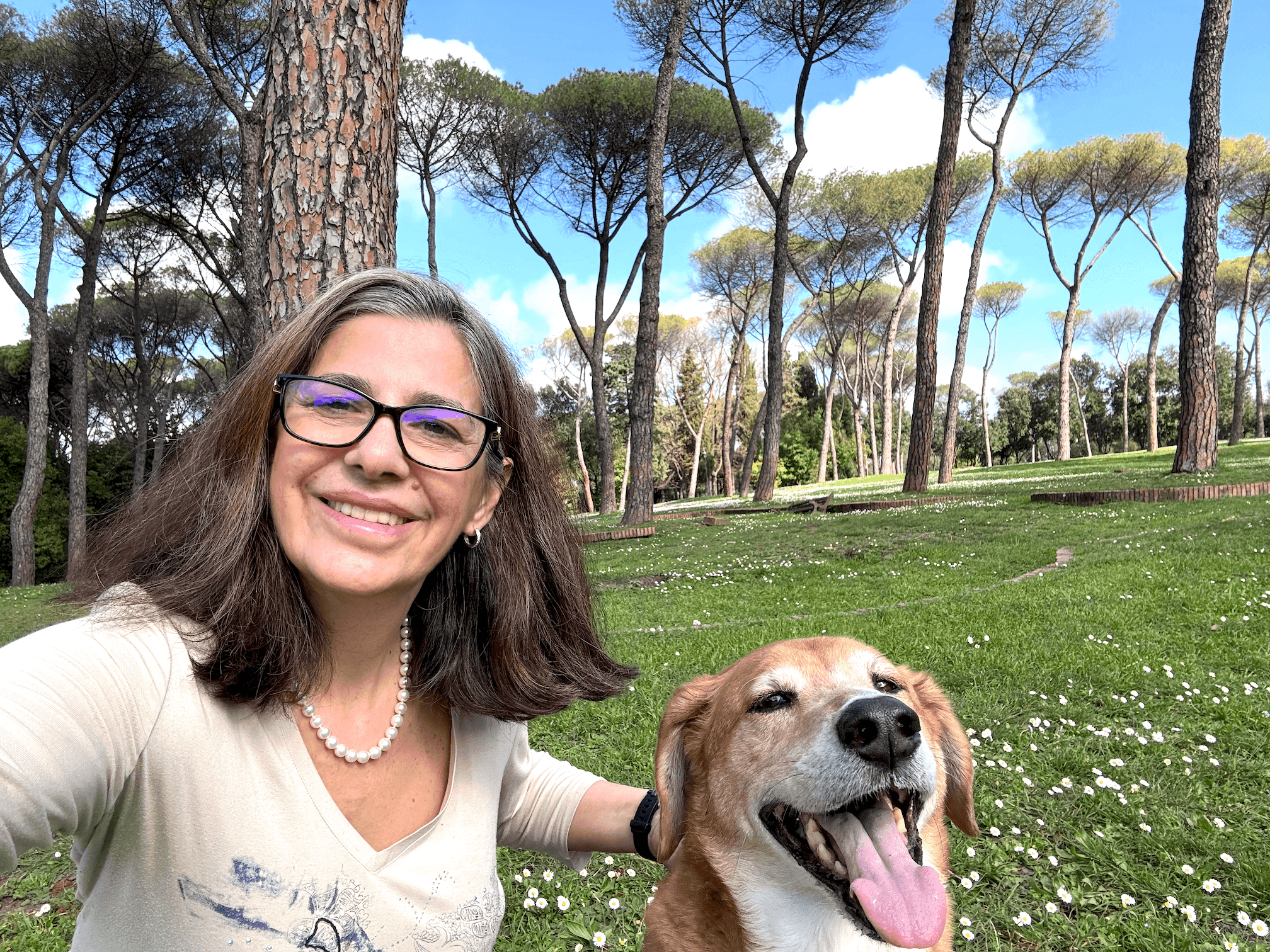Jojo and her dog Shek under umbrella pines in Rome